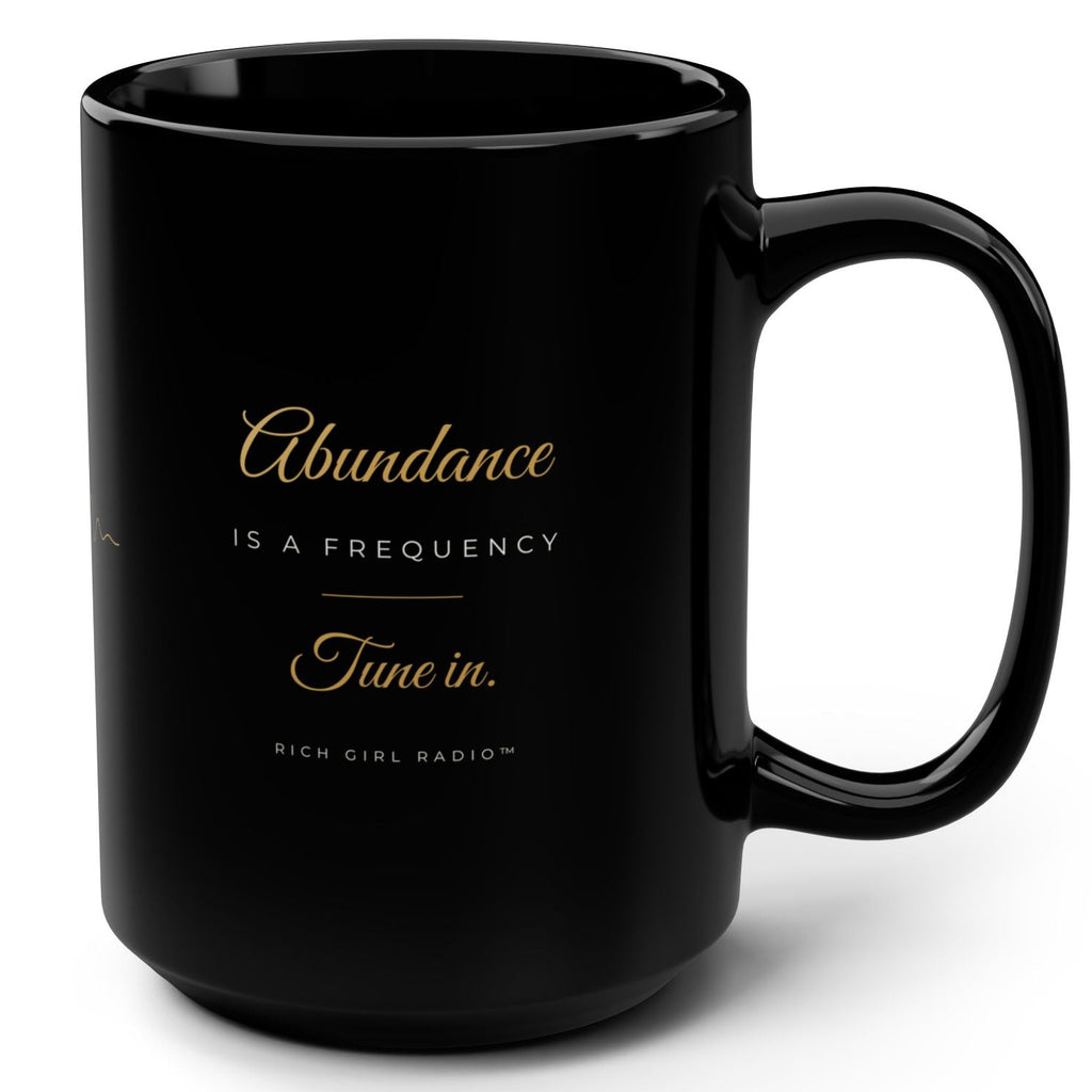 1. Black 15oz Abundance Is a Frequency affirmation mug with gold script, handle on the right
2. Black and gold Rich Girl Radio affirmation coffee mug, handle on the left
3. Side view of glossy black 15oz ceramic mug showing C-shaped handle
4. Back of black affirmation mug with gold frequency sound wave design