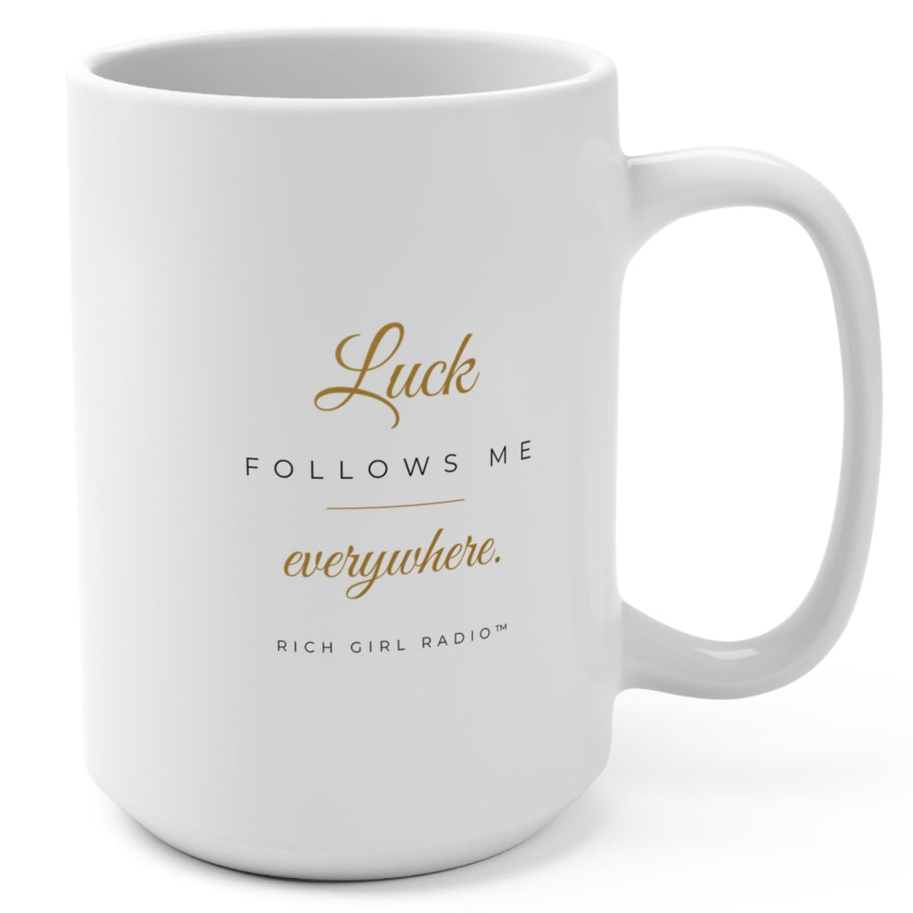 1. White 15oz Luck Follows Me Everywhere affirmation mug with gold script, handle on the right
2. Back of white lucky mug with gold heart four-leaf clover design
3. White and gold Rich Girl Radio Luck Follows Me Everywhere coffee mug, handle on the left
4. Side view of glossy white 15oz ceramic mug showing C-shaped handle