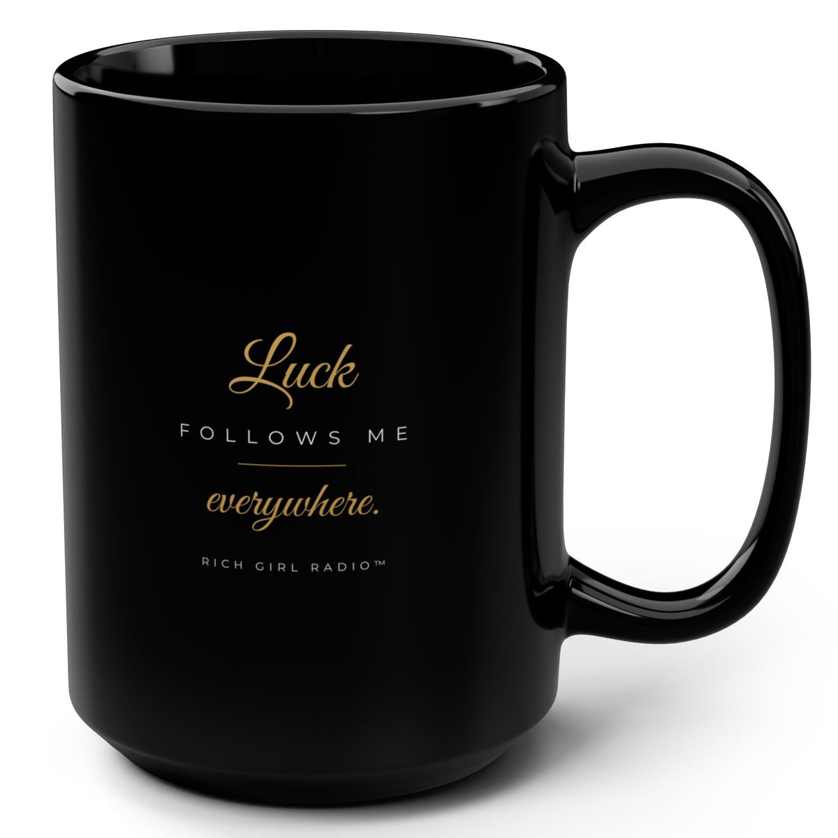 1. Black 15oz Luck Follows Me Everywhere affirmation mug with gold script, handle on the right
2. Back of black lucky mug with gold heart four-leaf clover design
3. Black and gold Rich Girl Radio Luck Follows Me Everywhere coffee mug, handle on the left
4. Side view of glossy black 15oz ceramic mug showing C-shaped handle