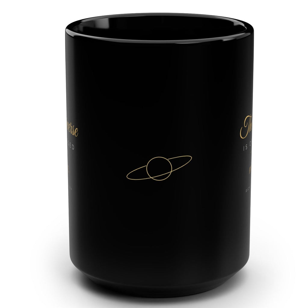 1. Black 15oz The Universe Is Obsessed With Me affirmation mug with gold script, handle on the right
2. Black and gold Rich Girl Radio celestial coffee mug, handle on the left
3. Side view of glossy black 15oz ceramic mug showing C-shaped handle
4. Back of black celestial mug with gold ringed planet design