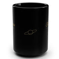 1. Black 15oz The Universe Is Obsessed With Me affirmation mug with gold script, handle on the right
2. Black and gold Rich Girl Radio celestial coffee mug, handle on the left
3. Side view of glossy black 15oz ceramic mug showing C-shaped handle
4. Back of black celestial mug with gold ringed planet design