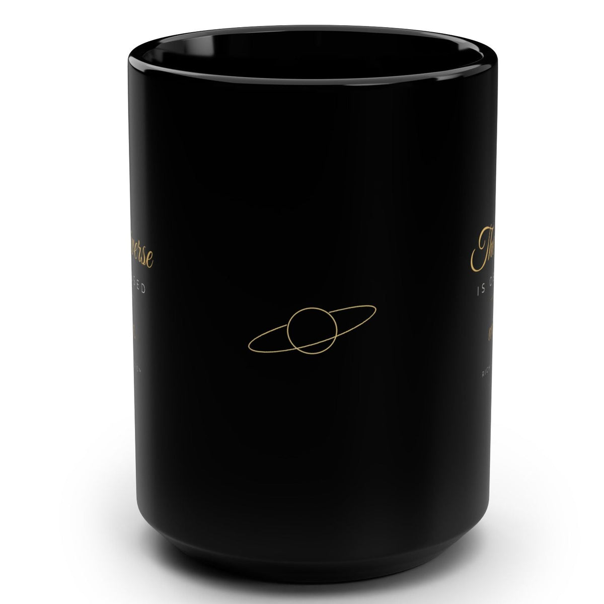 1. Black 15oz The Universe Is Obsessed With Me affirmation mug with gold script, handle on the right
2. Black and gold Rich Girl Radio celestial coffee mug, handle on the left
3. Side view of glossy black 15oz ceramic mug showing C-shaped handle
4. Back of black celestial mug with gold ringed planet design