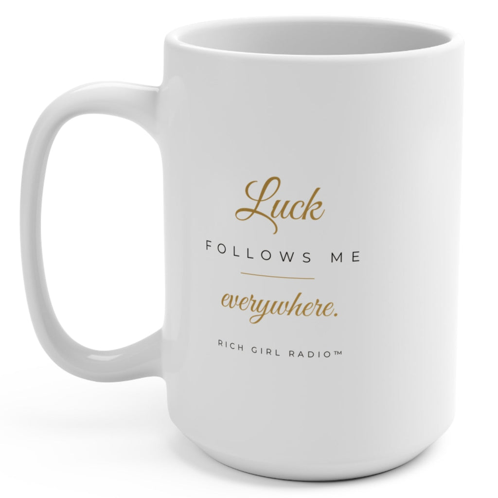 1. White 15oz Luck Follows Me Everywhere affirmation mug with gold script, handle on the right
2. Back of white lucky mug with gold heart four-leaf clover design
3. White and gold Rich Girl Radio Luck Follows Me Everywhere coffee mug, handle on the left
4. Side view of glossy white 15oz ceramic mug showing C-shaped handle