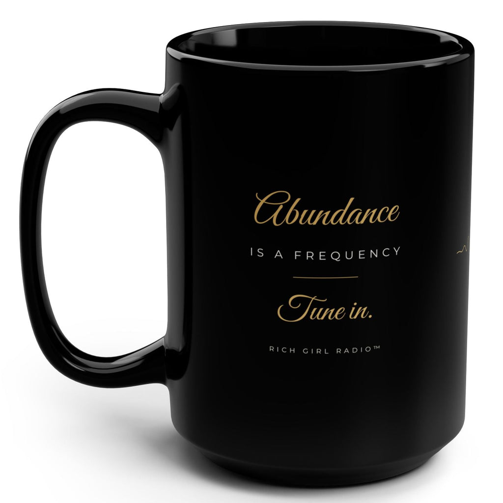 1. Black 15oz Abundance Is a Frequency affirmation mug with gold script, handle on the right
2. Black and gold Rich Girl Radio affirmation coffee mug, handle on the left
3. Side view of glossy black 15oz ceramic mug showing C-shaped handle
4. Back of black affirmation mug with gold frequency sound wave design