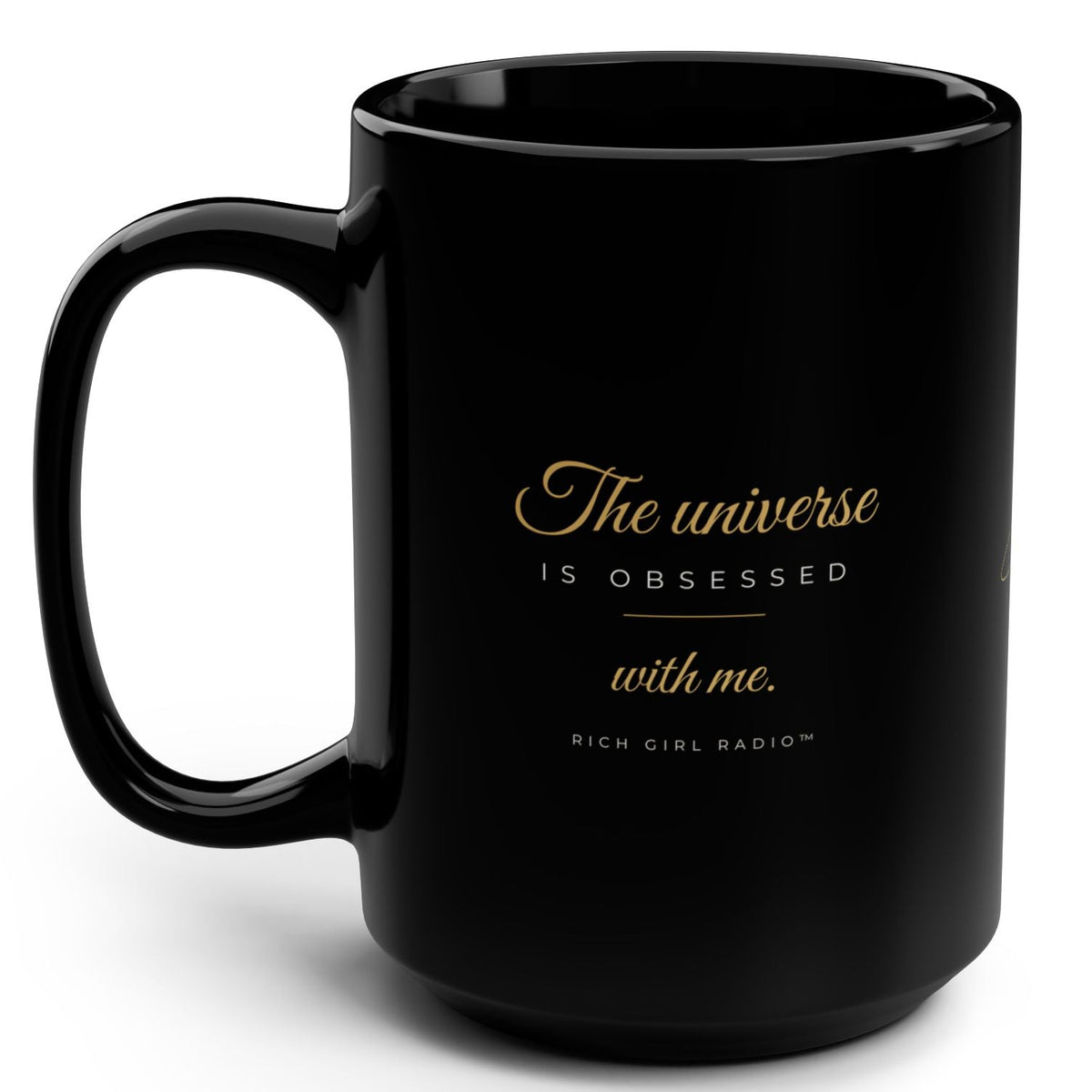 1. Black 15oz The Universe Is Obsessed With Me affirmation mug with gold script, handle on the right
2. Black and gold Rich Girl Radio celestial coffee mug, handle on the left
3. Side view of glossy black 15oz ceramic mug showing C-shaped handle
4. Back of black celestial mug with gold ringed planet design