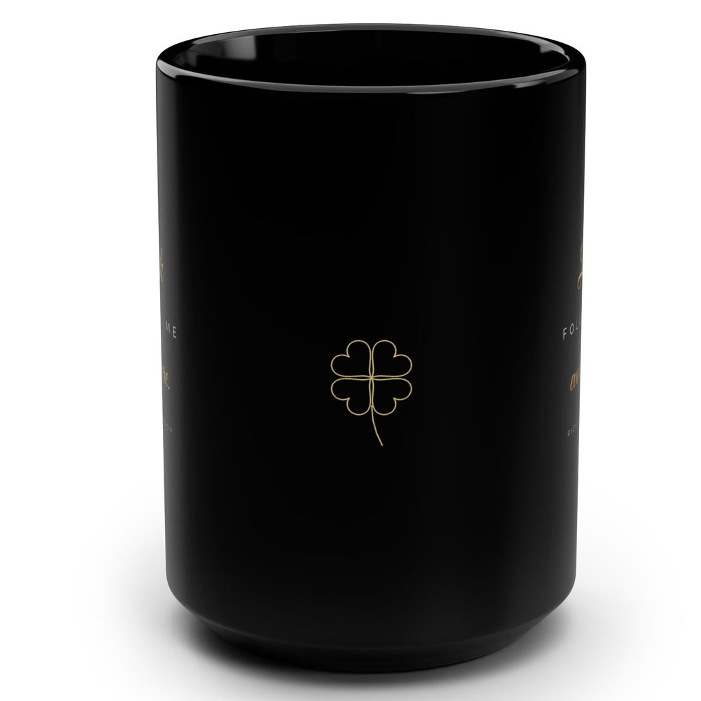 1. Black 15oz Luck Follows Me Everywhere affirmation mug with gold script, handle on the right
2. Back of black lucky mug with gold heart four-leaf clover design
3. Black and gold Rich Girl Radio Luck Follows Me Everywhere coffee mug, handle on the left
4. Side view of glossy black 15oz ceramic mug showing C-shaped handle